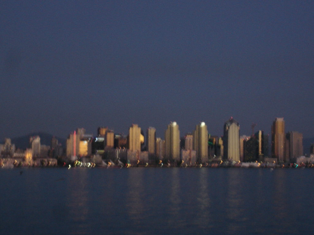 Downtown towers shimmer along San Diego Bay