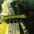 Providing crossing infrastructure at key points along transportation corridors is known to improve safety, reconnect habitats and restore wildlife movement. Throughout Europe, Asia, Australia and North American, wildlife crossing structures have been implemented with demonstrable success. 